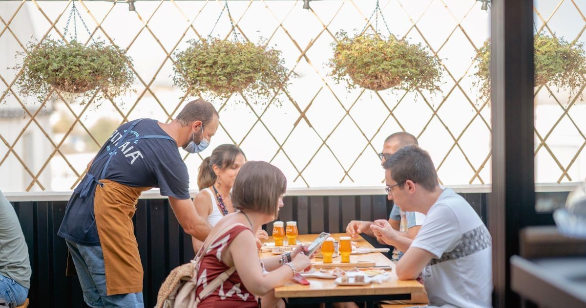 Guided beer tasting at Althaia Beers in Altea with flights paired to local cheeses and sausages.
