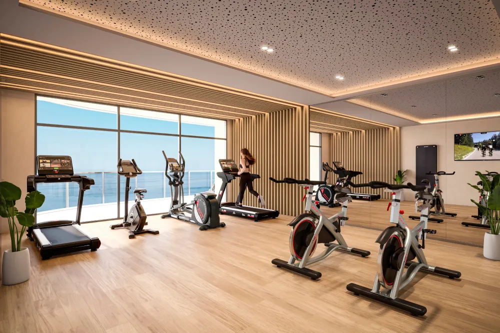 TM Tower fitness studio with cardio and cycling facing the Mediterranean.