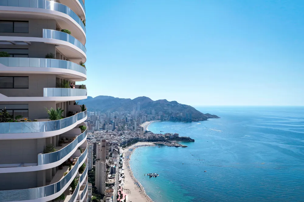 TM Tower terraces overlooking Poniente Beach and Benidorm skyline.