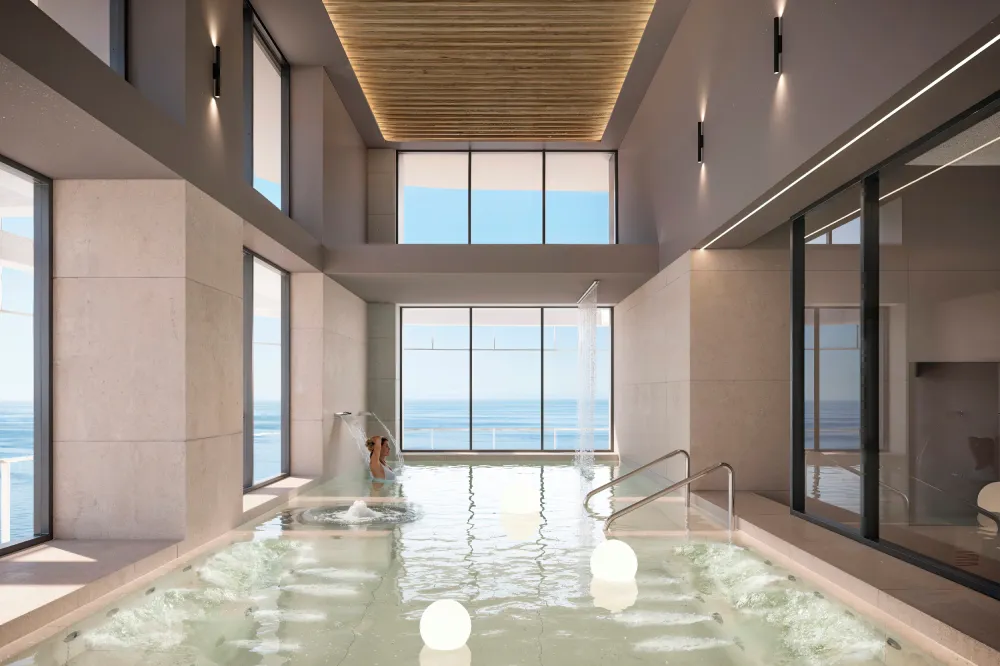 TM Tower indoor hydrotherapy pool with sea views and spa features.