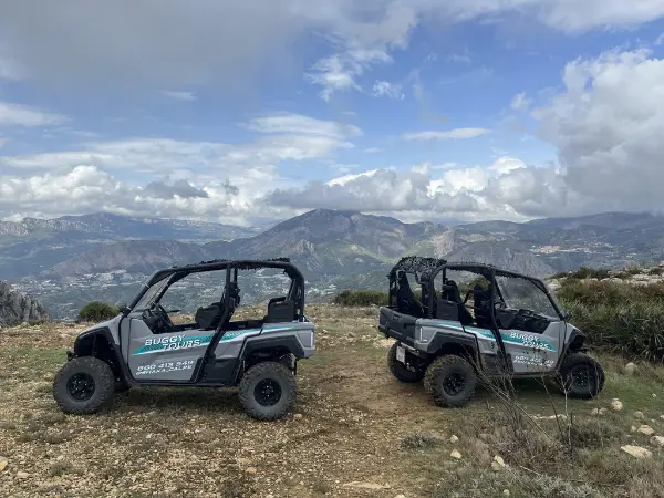 Off-Road Buggy Experience with Panoramic Views in Calpe Two Shaka Adventure buggies parked at a scenic mountain viewpoint overlooking the Costa Blanca