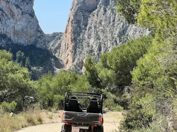Shaka Adventure Buggy Tour Through the Mountains of Calpe Buggy driving through a mountain valley near Calpe during a guided Shaka Adventure off-road tour