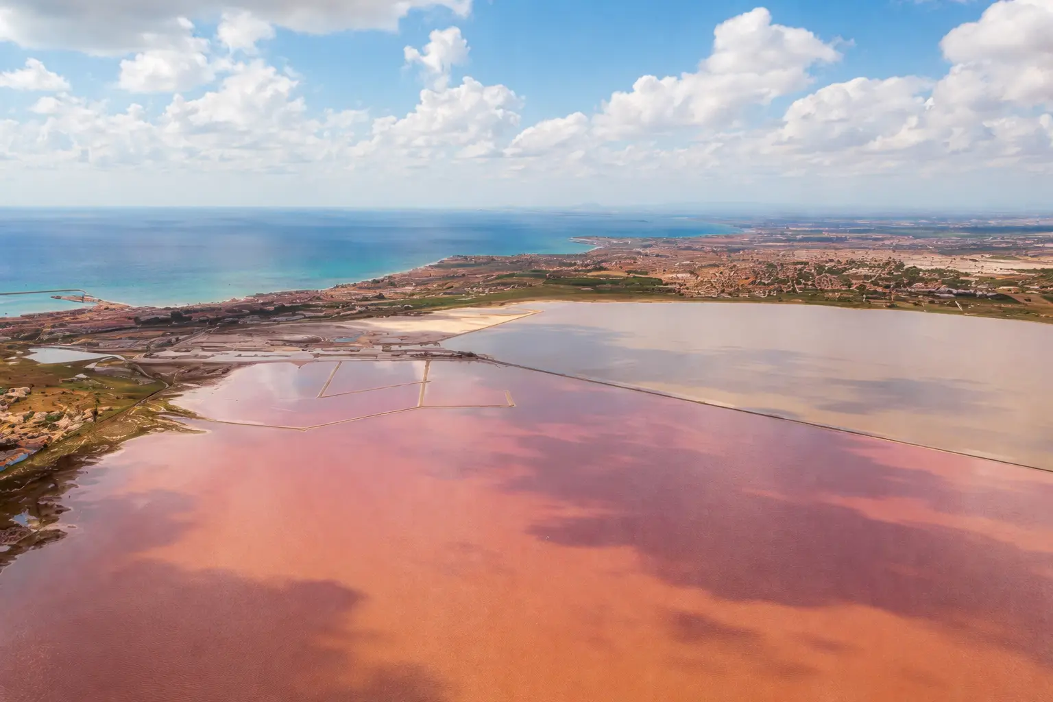 La Mata and Torrevieja Pink Salt Lakes Aerial View Costa Blanca Aerial view of the pink salt lake at La Mata Torrevieja Natural Park with surrounding lagoons and Mediterranean coastline in Alicante