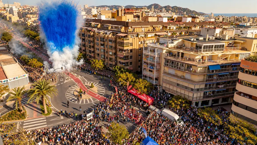 Locals in regional dress take part in the floral offering during Benidorm's Fiestas Patronales